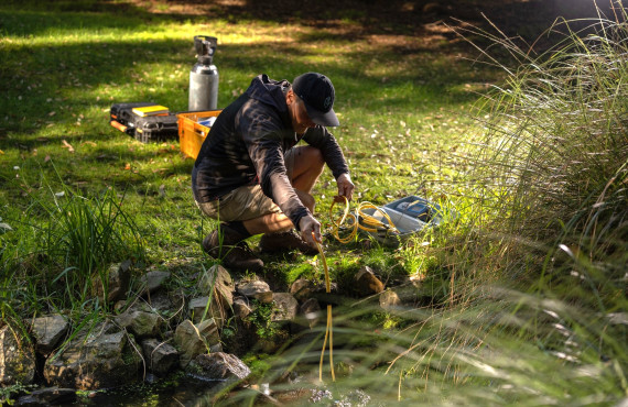 Programme co lead Uwe Morgenstern sampling a spring credit Earth Sciences New Zealand